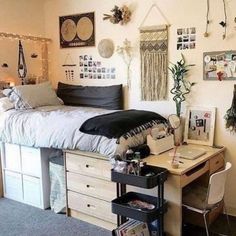 a bedroom with a bed, desk and other items