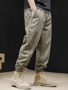 Men's ins Harem Bound Feet Cargo Pants
Features：

 	Product ID:CP0061
 	Material:Cotton
 	Season:Spring,Summer,Autumn,Winter
 	Color:Dark Gray,Black,Khaki

Size Chat： Casual Khaki Parachute Pants For Outdoor Activities, Urban Style Khaki Bottoms For Winter, Casual Khaki Bottoms For Winter, Casual Baggy Bottoms For Outdoor Activities, Baggy Casual Bottoms For Outdoor Activities, Casual Long Pants For Outdoor Activities, Casual Ankle-length Pants For Outdoor Activities, Khaki Trousers For Outdoor Activities, Urban Style Khaki Pants For Summer