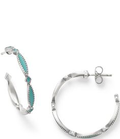 From James Avery&#x2C; these ear posts feature:Sterling silverTeal enamelPost backApprox. 1.06" longMade in the USA.