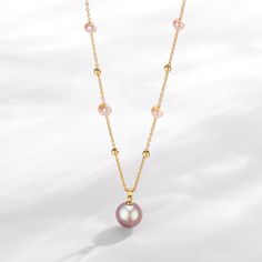 Fall in love with House of Pearls’ timeless, classic teardrop pendant necklace. Crafted from 14K gold-filled metal and freshwater pearls, this piece is perfect for a night out or day in. The white and purple pearls have a unique and special hue that will make anyone stop, stare, and ask where you got it. Get your hands on this best-selling necklace and make a statement every time you wear it. 14k Gold Filled Freshwater Pearl Necklace This glamorous necklace features shimmering white freshwater p Teardrop Akoya Pearl Necklaces With Pearl Chain, Akoya Pearl Teardrop Necklaces With Pearl Chain, Teardrop Akoya Pearl Chain Necklaces, Purple Pearl Drop Necklaces, Gold Teardrop Akoya Pearl Necklace, Rose Gold Teardrop Necklace With Pearl Pendant, Gold Akoya Pearl Teardrop Necklace, Elegant Purple Pearl Pendant Necklace, Elegant Purple Pearl Drop Necklace