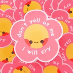 a bunch of pink stickers with yellow and red flowers on them that say i will cry