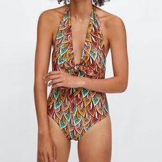 New With Tag Zara Leaf Print Swimsuit Printed Swimsuit With Plunge Neckline And Tie Halter. Contrasting Inner Lining. Model Height: 5’10” Printed Halter Neck Swimwear For Party, Printed Halter Neck Bodysuit For Poolside, Printed Halter Neck Bodysuit For Beach Season, Zara Summer Beach Bodysuit, Chic Zara Swimwear For Vacation, Zara Summer Bodysuit For Beach, Chic Zara Swimwear, Chic Zara Bodysuit For Beach, Chic Zara Bodysuit For The Beach