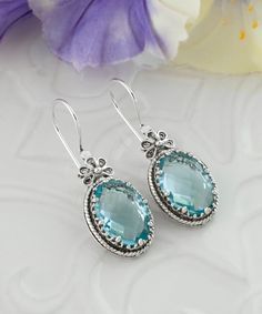 Silver Topaz Teardrop Earrings, Silver Teardrop Topaz Earrings, Elegant Blue Sterling Silver Earrings, Elegant Blue Topaz Nickel-free Earrings, Elegant Nickel-free Blue Topaz Earrings, Blue Topaz Earrings As A Gift, Silver Topaz Earrings With Gemstone, Silver Topaz Gemstone Earrings, Silver Blue Topaz Earrings Fine Jewelry