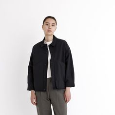 A shirt jacket with a utilitarian touch. Features a paneled construction, spread collar, and button placket. The design is anchored by two oversized gusseted side pockets. Relaxed fit. A staple for transitioning seasons. + Details Color: Black 55% Linen, 45% Cotton XS, S, M, L, XL Julie is 5'9" and wearing a size S Junho is 6'0" and wearing a size S Hand wash cold, lay flat to dry. Do not tumble dry. Can be dry cleaned. + Material A mid-weight woven 55% Linen, 45% Cotton material. This material Knitwear Dress, Pocket Jacket, Pocket Shirt, Signature Collection, Shirt Jacket, Cotton Material, Knitwear, Relaxed Fit, How To Wear