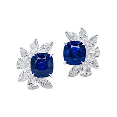 Sapphires - a timeless gemstone with an eye-catching appeal. This Vihari Jewels pair of Royal Blue cushion shape Sapphire earrings feature a 3.48 carat and 3.30 carat matching pair that will never go out of style. GRS (#2020-088222) has certified the sapphires as being naturally "vivid blue" in color with no artificial heating. Each sapphire is surrounded by marquise and pear shape diamonds. There are 2.29 carats of white diamonds (all F color, VS+ clarity); both earrings are set in 18K White Go Luxury Blue Solitaire Jewelry, Royal Blue Luxury Jewelry, Luxury Royal Blue Luxury Jewelry, Luxury Royal Blue Gemstone Jewelry, Luxury Sapphire Wedding And Engagement Jewelry, Luxury Royal Blue Fine Jewelry, Luxury Sapphire Round Cut Earrings, Luxury Sapphire Earrings In Elegant Style, Luxury Hallmarked Sapphire Jewelry