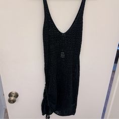 Fashion Nova Small Black Crochet Swim Cover Up Dress With Tie Side. Never Been Worn With Tags Still Attached Black V-neck Crochet Dress For Summer, Black Mini Dress For Beach Cover-up, Black Crochet Beachwear Dress For Beach, Black Crochet Beachwear Dress, Black Crochet Beach Dress For Summer, Black Crochet Dress For Beach, Black Crochet Dress For Summer Beach, Black Crochet Beach Cover-up Dress, Black Crochet Dress For Beach Season