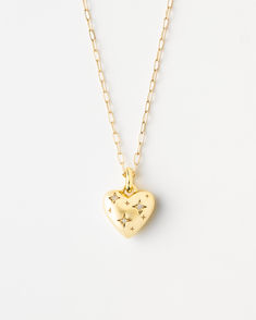 Designed with poet, author and actor, Arielle Estoria, to celebrate your inner magic and infinite worth. Inspired by her motto, "Words not for the ears but for the soul,” this puffy heart necklace reminds you that words are meant to be felt and experienced, not just heard. Spiritual Heart-shaped Charm Necklaces, Gold Heart-shaped Spiritual Necklace, Spiritual Heart-shaped Brass Necklace, Spiritual Heart-shaped Brass Necklaces, Personalized Heart-shaped Spiritual Necklace, Puffy Heart Necklace, Puffy Heart, Heart Necklace