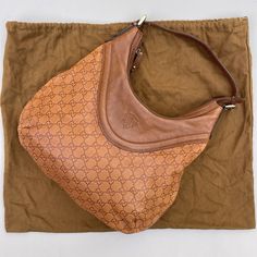 This Beautiful Gucci Guccisima Hobo Bag Is A Must-Have For Any Fashion-Forward Woman. The Exterior Is Made Of High-Quality Brown Leather With The Iconic Gucci Monogram Pattern. The Bag Features A Zip Closure And A Brown Leather Handle/Strap That Complements The Gold Hardware. The Interior Is Lined With Beige Fabric And Has Enough Space For All Your Essentials. Things To Note: * Light Corner Rubbing * Exterior Scratches/Rubbing On Leather * Interior Is Clean With No Smell * Zipper Runs Smoothly * Gucci Monogram, Leather Interior, Hobo Bag, Brown Gold, Leather Handle, Gucci Bag, Brown Leather, Dust Bag, Fashion Forward