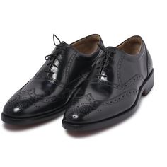 The classic brogue with wingtip in sleek black polished leather can bring effortless sophistication to your outfit when styled correctly. Manufactured with 100% genuine leather of premium quality, which offers a durable and comfortable wear Handmade with detail to finesse, from stitching to inner lining that highlights the quality of the product. The iconic pattern of rows of holes and perforations along the edges of the design gives brogues its name. Masculine Wingtip Lace-up Business Shoes, Black Wingtip Lace-up Shoes For Formal Occasions, Black Wingtip Dress Shoes With Brogue Detailing, Black Wingtip Oxfords For Derby, Masculine Wingtip Business Lace-up Shoes, Black Wingtip Oxfords For Semi-formal Occasions, Business Wingtip Lace-up Shoes With Leather Sole, Masculine Wingtip Leather Shoes With Brogue Detailing, Masculine Leather Wingtip Shoes With Brogue Detailing