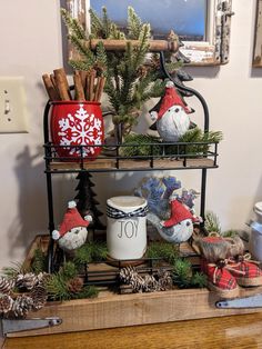 a shelf with christmas decorations on top of it