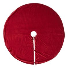 a red round cushion with a white pole sticking out of it's center piece