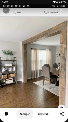 an open living room and dining room with wood floors