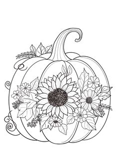 a pumpkin decorated with flowers and leaves