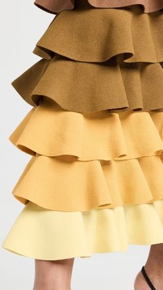 Fabric: Mid-weight knitTiered ombre rufflesCovered elastic waistbandShell: 83% viscose/17% polyesterDry cleanMade in ItalyStyle #ROSDB30171 Black Ruffle Skirt, Tiered Midi Skirt, Lace Midi Skirt, Striped Maxi Skirts, Tiered Ruffle Skirt, Rosie Assoulin, Striped Maxi, Lace Midi, Gathered Skirt