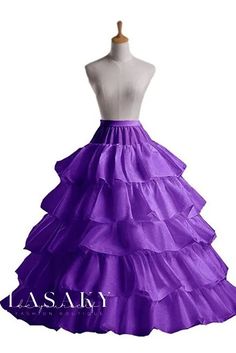 a dress on a mannequin with purple ruffles