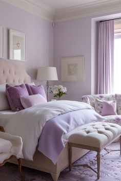 a bedroom with purple walls and white furniture