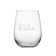 a wine glass with the word kate etched on it's side, in front of a white background