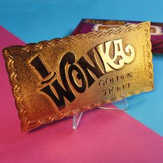 a gold sign that says wow on it