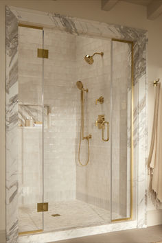 Bathroom shower design look with white tile shower, stone threshold, and brass shower fixtures. Mcgee Bathroom, Studio Mcgee Bathroom, Timeless Bathroom, Bathroom Collections, Studio Mcgee, Faucet Handles, Bathroom Renos, Bath Design