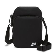 Gear up on the go with the Nike Sportswear Heritage Crossbody Pack. An adjustable strap allows you to customize the fit to wear this pack across your body. Zippered pockets allow for convenient and secure small-item storage while you're out having fun. Zippered main compartment securely stores your things. Lock-in clasp closure. Inside pocket keeps small items organized. Adjustable crossbody strap for versatile carrying options. Dimensions: 9"" H x 6"" W x 3"" D. Shell: 100% densely woven polyes Nike Crossbody Bag, Mochila Nike, Nike Sb Zoom, Nike Bags, Small Item Storage, Nike Blazer, Black Crossbody, Black & White, Black Cross Body Bag