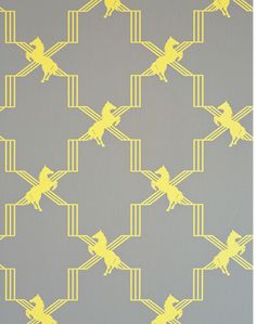 yellow and gray wallpaper with an abstract design on the bottom half of the wall