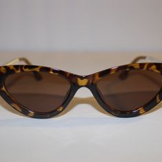 Cheetah Cat Eye Pearl Sunglasses Chic Leopard Print Cat Eye Sunglasses, Brown Cat Eye Sunglasses With Glass Lenses, Leopard Print Cat Eye Sunglasses With Gradient Lenses, Leopard Print Cat Eye Sunglasses With Uv Protection, Polarized Leopard Print Cat Eye Sunglasses, Chic Cat Eye Sunglasses In Leopard Print, Brown Cat Eye Sunglasses For Beach, Brown Cat Eye Sunglasses For The Beach, Spring Brown Cat Eye Sunglasses With Tinted Lenses