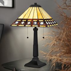 a lamp that is on top of a table