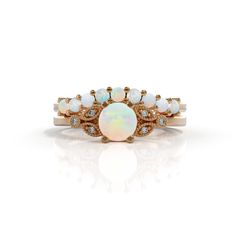 Set Opal engagement ring opal and diamond October birthstone 14k rose gold gold 2mm Matching Wedding Band Women White opal engagement ring with lovely diamonds, set in 14k solid gold. ► FEATURES; Gemstones: natural opal : 9 x2mm opal Gemstones: natural opal : 5mm , diamond: 6x1 mm total diamond carat weight: 0.03 (color H; clarity VS) Material options: 14k rose gold, 14k yellow gold, 14k white gold Size: all ring sizes are available How to Order: Please select your preferred size and material fr Heirloom White Opal Ring, White Opal Stackable Promise Rings, White Opal Stackable Rings For Promise, Heirloom White Opal Gemstone Ring, White Opal Ring With Round Band For Wedding, Opal Birthstone Stackable Wedding Rings, Opal Stackable Birthstone Rings For Wedding, Opal Birthstone Stackable Rings For Wedding, White Opal Stackable Round Rings