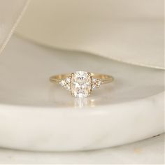 a diamond ring with three stones on it