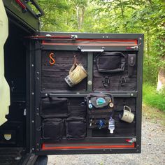 the back end of a truck filled with items