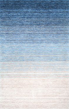 an area rug with blue and white stripes