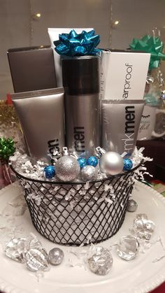 a basket filled with silver items on top of a white plate