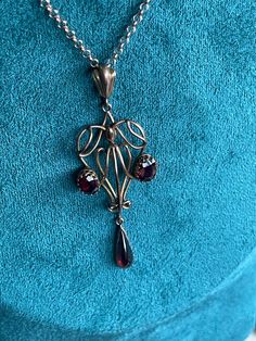 Antique Victorian Handmade garnet Pendant circa 1890's  Totally Handmade setting see photos 3.5grams without the chain  I added a modern 18" rose gold vermeil heavy chain  With associations with the heart, blood, inner fire, and life force, GARNETS have long been considered symbols of love. Garnet symbolism also extends to friendship. FREE SHIPPING! Antique box not included- for photo only. The Victorian era is generally agreed to stretch through the reign of Queen Victoria (1837-1901). It was a tremendously exciting period when many artistic styles flourished. The beginning of the Victorian era in 1837 also coincided with the beginning of the Romantic Movement, which was a rediscovery of the Renaissance. In the making of the jewelry, goldsmiths took inspiration from medieval and Renaissan Victorian Bronze Metal Necklace, Antique Garnet Necklace, Ornate Garnet Filigree Jewelry, Ornate Red Garnet Jewelry, Victorian Garnet Necklace, Heavy Chain, Garnet Pendant, Antique Boxes, Victorian Art