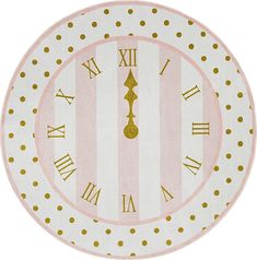 a pink and gold polka dot clock with roman numerals on the face is shown