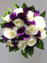 a bouquet of white and purple flowers