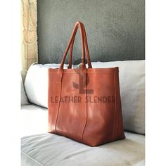 "Beautiful Oversized tan leather bag. Unlined, but it includes 3 big inside pockets. There is also the possibility to include a whole inside lining, and then we could add all the inside pockets that you need, if you are interested, please contact us. Simple and stylish. You can use it as a weekender bag, or if you need to carry a lot of stuff for your day. --------------------------------------------------------------------------------------------------- Optional: Add Zipper: The bag keeps the shape and the same aperture of the bag as if the bag had no zipper, but you can close it when necessary (you can see the bag with zipper in a couple of pictures of the black bag). Inside lining: There is also the possibility to include a whole inside lining, and then we could add all the inside pocke Large Brown Satchel For Daily Use, Large Rectangular Leather Bag, Large Brown Shoulder Bag For Travel, Brown Travel Bag For Daily Use, Large Leather Bag For Daily Use, Large Rectangular Leather Shoulder Bag, Large Leather Satchel Bag, Brown Shoulder Bag With Luggage Sleeve For Shopping, Office Bag With Large Capacity In Cognac