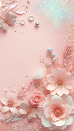 pink flowers and glitters on a pink background