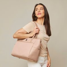 This structured tote is made from lightweight oxford fabric that's durable and water-resistant, featuring our signature 4-way-wear modes that you love, fits 15" laptops, and now you can easily slide it over your luggage. It’s the perfect carryall for work, travel, and anywhere your day brings you. Pink Travel Bag With Laptop Sleeve, Pink Laptop Bag For Everyday Use, Everyday Pink Bag With Laptop Sleeve, Pink Functional Travel Diaper Bag, Trendy Travel Laptop Bag With Luggage Sleeve, Trendy Laptop Bag With Luggage Sleeve For Travel, Pink Functional Laptop Bag For Travel, Laptop Tote Bag With Luggage Sleeve For Commuting, Functional Pink Laptop Bag For Travel