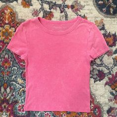 American Eagle Pink Baby Tee!! Never Worn Perfect Condition!! 8th Grade Outfits, Poshmark Clothes, Pink Baby Tee, Pink Shirts, American Eagle Outfits, American Eagle Shirts, Preppy Clothes, Pinterest Closet, Shirts Women