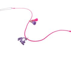 "Purchase the Calico Sun™ Cat Zoey Necklace at Michaels. com. For the kitten-loving person, this beautiful pink ball chain necklace features an enamel coated purple cat charm with delightful pink and purple tassels that bring the complementary colors of the necklace together. For the kitten-loving person, this beautiful pink ball chain necklace features an enamel coated purple cat charm with delightful pink and purple tassels that bring the complementary colors of the necklace together. Adjustab Playful Pink Charm Necklaces, Playful Pink Jewelry With Removable Charms, Playful Pink Charm Necklace For Friendship, Playful Purple Dangle Jewelry, Playful Pink Charm Necklaces For Friendship, Playful Adjustable Necklace With Lobster Clasp, Playful Pink Jewelry With Adjustable Chain, Playful Adjustable Necklaces With Charms, Playful Purple Hypoallergenic Jewelry