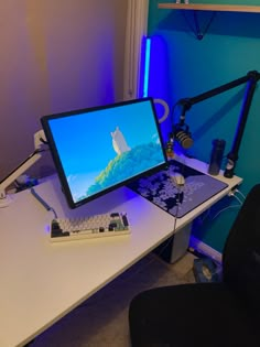 a computer monitor sitting on top of a white desk