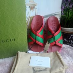 Gucci Rubber Web Womens Criss Cross Slide Sandals Coral New Shamarock. Available In Size 6 And 8. Brand New In A Box Comes With Two Dustbag And Care Card. This Is An Authentic Pair Of Gucci Rubber Web Womens Criss Cross Slide Sandals Size 38 In Coral And New Shamrock. These Stylish Sandals Are Crafted Of Red And Green Rubber. They Feature A Pink Rubber Bottom With A Crossover Band Of Gucci Classic Red And Green Web. Made In Italy Gucci Green Flat Sandals, Green Flat Gucci Sandals, Gucci Green Summer Sandals, Red Gucci Sandals For The Beach, Green Gucci Sandals For Summer, Gucci Green Sandals With Branded Insole, Gucci Green Sandals With Round Toe, Gucci Designer Sandals With Red Sole, Designer Red Sandals For The Beach