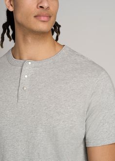 About Our Jersey Henley Tee for Tall Men The henley tee: effortless, comfortable and easy to style. An iconic wardrobe staple, it's high time there was a henley tee for tall men. This short sleeve is made with 100% jersey cotton that's incredibly soft and falls just right. Featuring our standard fit that's long enough for your torso without being baggy, it's a casual piece that goes with everything. Whether you pair it with chinos and jeans or your favorite joggers, you'll reach for this tall me Casual Cotton Crew Neck Henley, Relaxed Fit Cotton Henley, Casual Gray Henley Neckline Top, Casual Cotton Henley With Relaxed Fit, Casual Relaxed Fit Henley For Gatherings, Classic Henley Neckline Top With Relaxed Fit, Casual Henley Neckline Tops For Gatherings, Everyday Cotton Crew Neck Henley, Cotton T-shirt With Henley Neckline