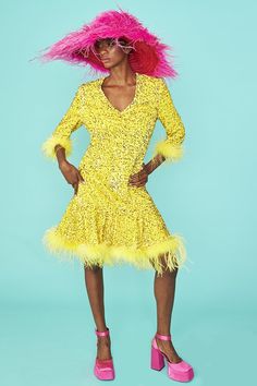 Upgrade sparkle season with this gorgeous skater sequin dress with feather trim on the sleeves and hem. This dress is crafted from our softest velvet which is adorned with yellow sequins.  15% Acrylic 85% Modacrylic 12% Elastane 88% Viscose Lining: 100% Viscose Feather Trim Dress, Dress With Feather Trim, Short Yellow Dress, Season Outfits, Cashmere Gloves, Party Kleidung, Chiffon Midi Dress, Feather Trim, Christmas Shop