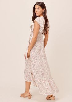 Cute Flutter Sleeve Floral Wrap Maxi Dress | LOVESTITCH Feminine Flowy Skirt Maxi Dress With V-neck, Flowy Maxi Wrap Dress For Beach, Bohemian Style Maxi Wrap Dress With Floral Print, Beach Maxi Dress With Ruffle Hem, Bohemian Maxi Wrap Dress With Floral Print, Flowy Maxi-length Wrap Dress For Beach, Flowy Maxi Length Wrap Dress For Beach, Bohemian Wrap Dress In Maxi Length With Floral Print, Bohemian Maxi-length Wrap Dress With Floral Print