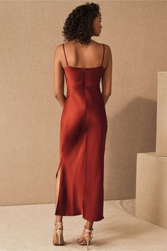 An elegantly draped cowl neckline completes this silky slip dress with a modern midi silhouette.Only available at BHLDN Fitted Silk Slip Dress In Solid Color, Elegant Ruched Slip Dress With Straight Neckline, Chic Draped Fitted Slip Dress, Formal Fitted Draped Slip Dress, Fitted Satin Draped Slip Dress, Fitted Draped Satin Slip Dress, Formal Pre-draped Slip Dress, Evening Satin Sheath Slip Dress, Evening Sheath Slip Dress In Satin