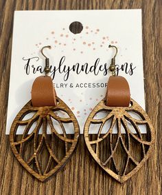 2.5” long **Lightweight leather design** Posts are hypoallergenic and nickel free Cnc Leather Projects, Glowforge Leather Projects, Leather And Wood Projects, Wood And Leather Earrings, Laser Leather Ideas, Laser Engraving Business, Laser Earrings, Laser Jewelry, Wood Burned Gifts