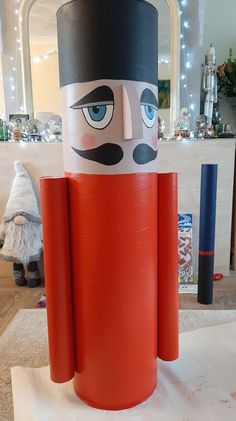 a large nutcracker is standing on top of a table