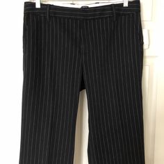 98% Cotton 2% Lycra Spandex Sits Low On The Waist And Straight Through The Hip Black Vertical Stripe Pants For Business Casual, Black Pants With Vertical Stripes For Business Casual, Business Casual Black Pants With Vertical Stripes, Black Business Casual Pants With Vertical Stripes, Striped Trousers For Business Casual, Pinstripe Fitted Ankle-length Bottoms, Fitted Pinstripe Ankle-length Bottoms, Fitted Black Pants With Vertical Stripes, Black Trousers With Vertical Stripes