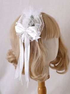 Adorn your hair with this charming feather-decorated white sweet floral bowknot hairclip. This delightful accessory features a lovely combination of white color, sweet floral design, and a decorative bowknot, making it the perfect addition to any kawaii or Lolita-inspired outfit.  Please note that this product includes only the hairclip. White Bow For Spring Party, White Ribbon Bow For Spring, Cute White Headband For Spring, White Bow With Matching Headband, White Headband With Bow Tie, White Bow Tie Headband, White Flower-shaped Hair Accessories With Matching Headband, White Floral Hair Accessories With Matching Headband, Cute White Party Hair Accessories